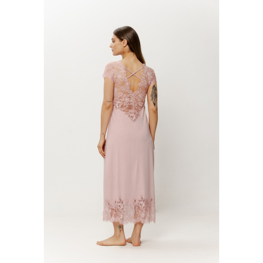 Close-up of openwork lace sleeve and bust ruching detail on pink nightgown