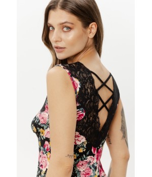 Close-up black lace bust detail on flowered viscose nightie