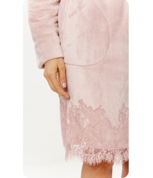 Pink bathrobe draped over shoulder showcasing shawl collar and sleeve