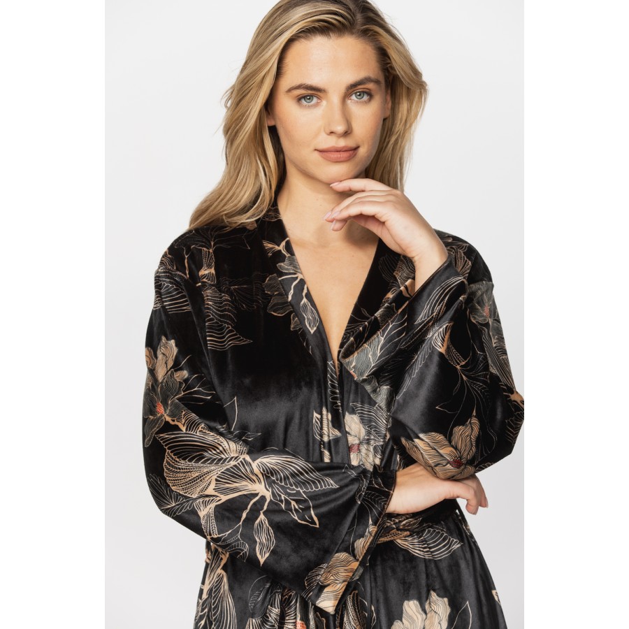 Gorgeous little velvet dressing gown printed with sketches of golden flowers on a black background