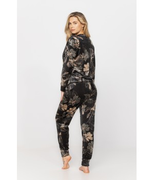 Velvet loungewear outfit printed with sketches of golden flowers on a black background