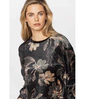 Velvet loungewear outfit printed with sketches of golden flowers on a black background