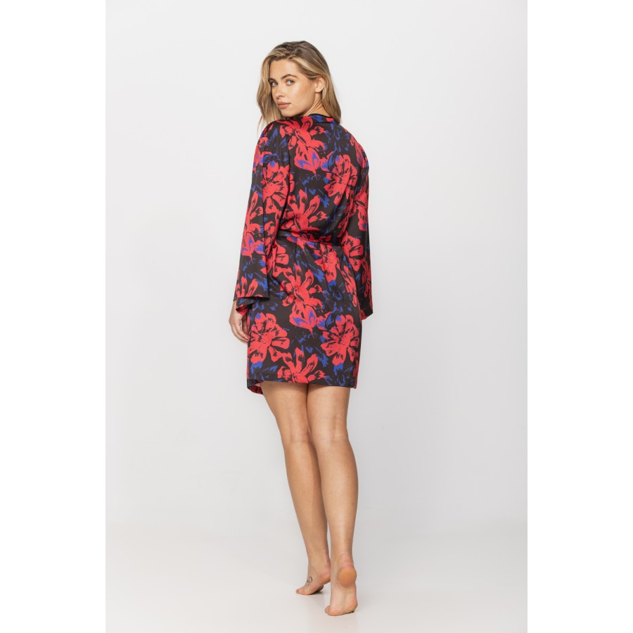 Gorgeous little long-sleeved dressing gown in silky satin fabric, with a red and blue motif printed on a black background