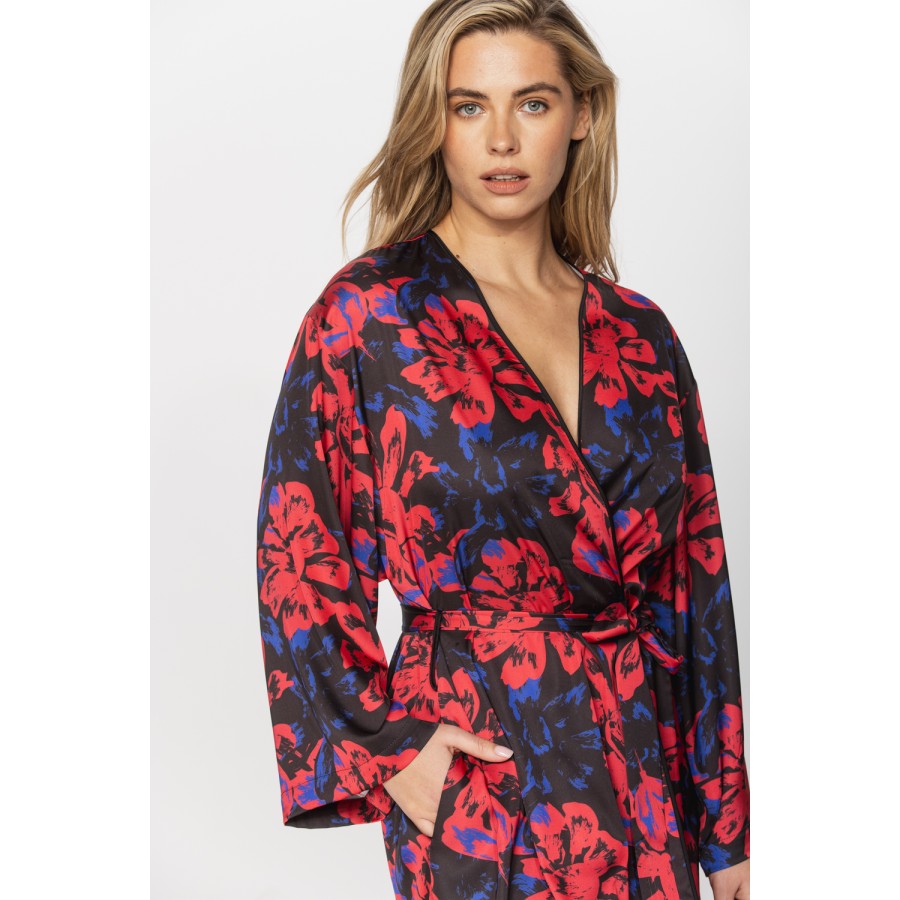 Gorgeous little long-sleeved dressing gown in silky satin fabric, with a red and blue motif printed on a black background