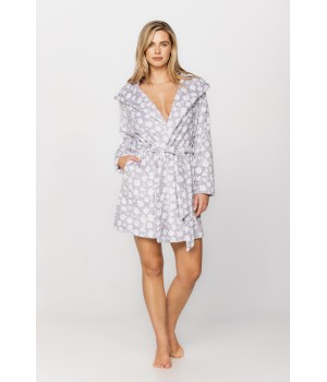 Gorgeous little bathrobe with hood in warm velvet and a floral print on a grey background