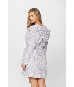 Gorgeous little bathrobe with hood in warm velvet and a floral print on a grey background