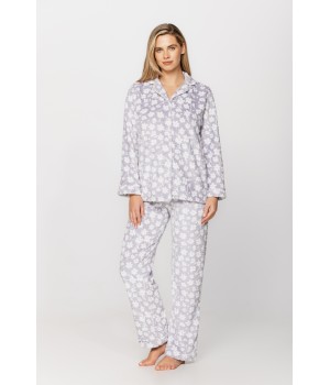 Warm velvet loungewear outfit, button-up top and straight-cut bottoms with floral print on a grey background