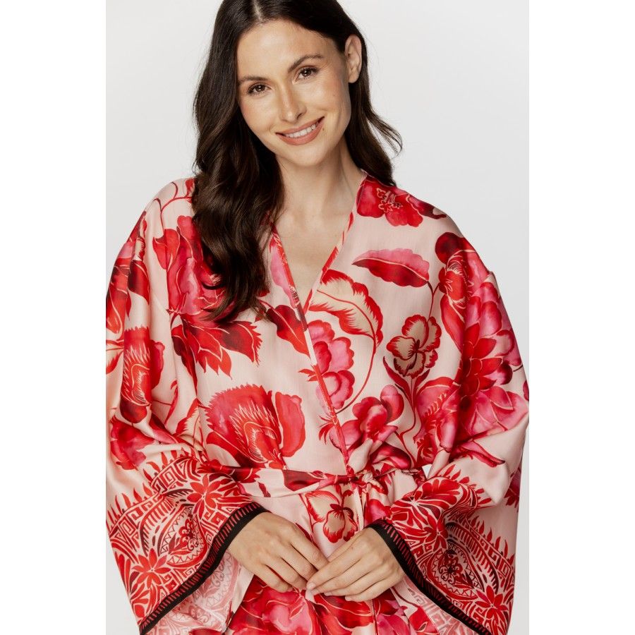 Ladies maxi dressing gown in printed viscose with shades of red, and loose-fitting long sleeves