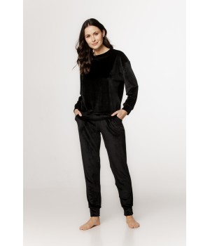 Velvet loungewear set with a round neck top, long sleeves, straight pants, and side pockets