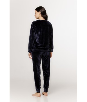 Velvet loungewear set with a round neck top, long sleeves, straight pants, and side pockets