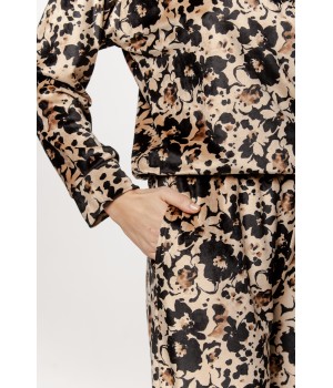 Floral patterned velvet loungewear pajama set with long sleeves and a round neckline.