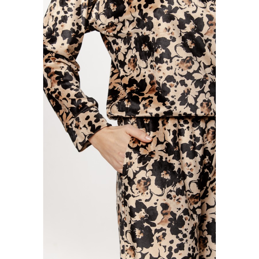Floral patterned velvet loungewear pajama set with long sleeves and a round neckline.