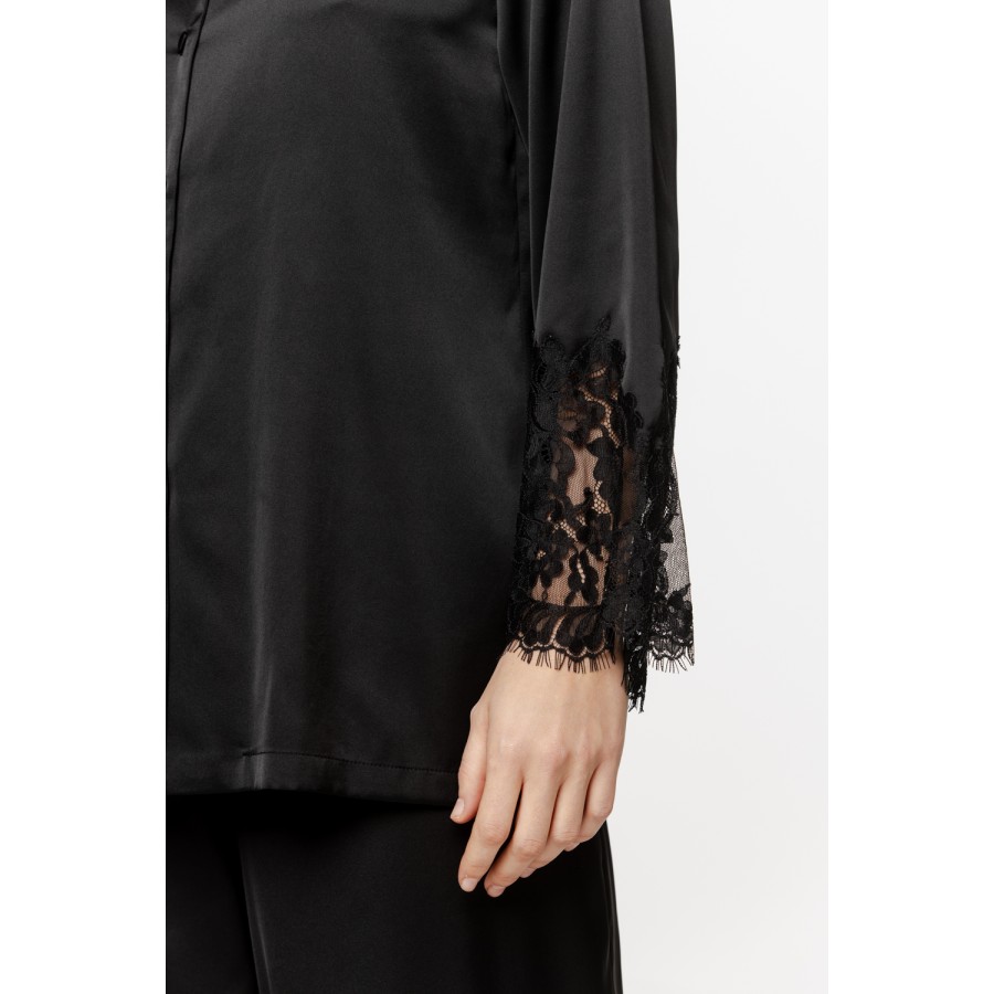 Beautiful satin pajama set with lace trim on the forearms and hem of the pants