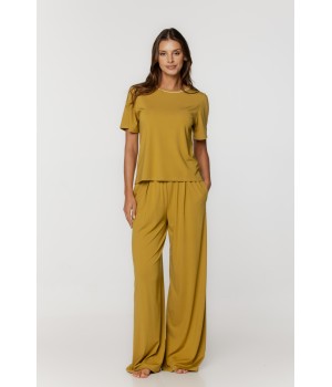 Loose-fitting, flowing pyjamas in rayon and nylon, cinched at the waist with side pockets