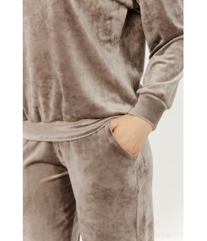 Detail of round neckline on long-sleeved velour top