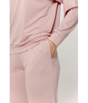 Side view of long-sleeve viscose pajama set showing trouser pocket and ankle gather
