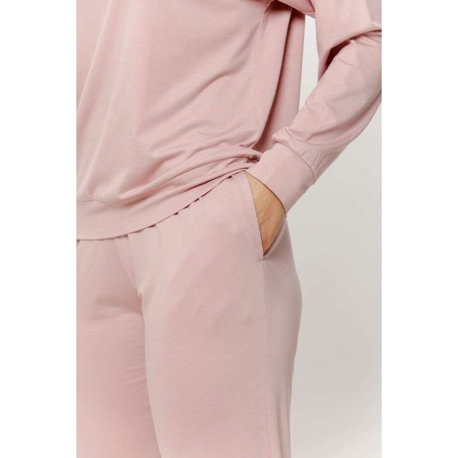 Side view of long-sleeve viscose pajama set showing trouser pocket and ankle gather