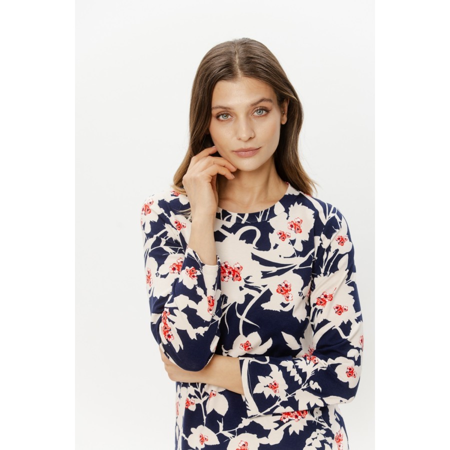 Gros plan sur l'imprimé fleuri viscose, texture du tissu et nuances du motif Noir