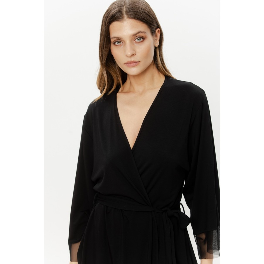 Back view of black fitted micromodal robe with tulle hem band