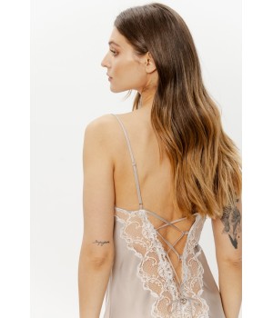 Adjustable spaghetti strap and lace eyelet detail