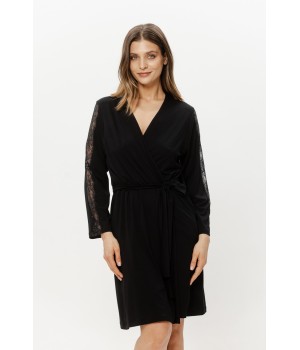 Close-up of fine lace trim on the sleeve cuff and side pocket of a black micromodal robe