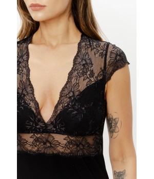 Close-up of floral lace pattern on black nightgown back