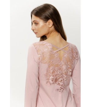 Close-up of intricate openwork lace on pajama top bodice