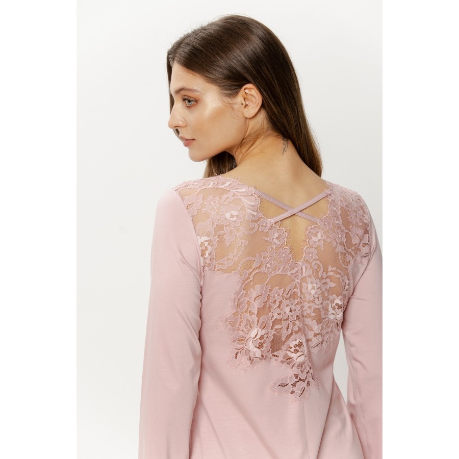 Close-up of intricate openwork lace on pajama top bodice